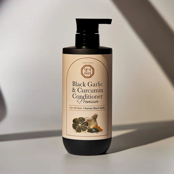 Balzams-maska matiem ar melnā ķiploka un kurkumas ekstraktu Daeng Gi Meo Ri Black Garlic & Curcumin Treatment