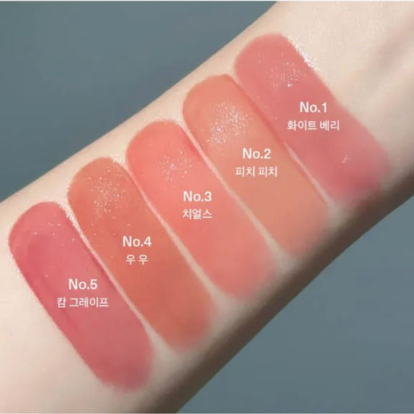 Drėkinantis lūpų blizgesys-tintas su švytinčiu efektu UNLEASHIA Berry Shot Lip Tint