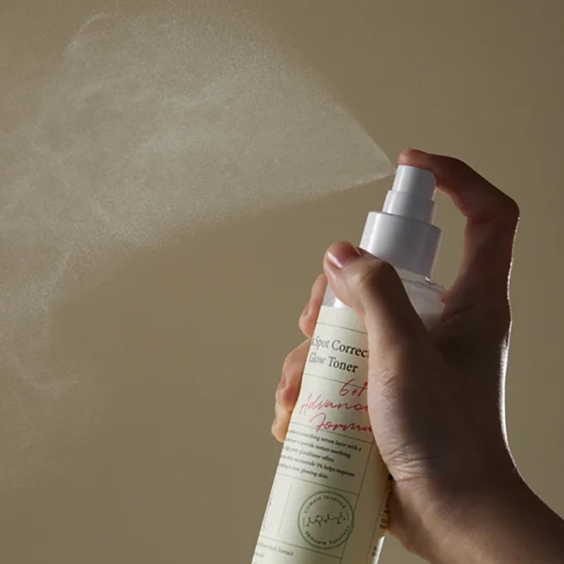 Balinošs izsmidzināmais toniks pēcaknes plankumu novēršanai Axis-Y Dark Spot Correcting Glow Toner