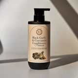 Balzams-maska matiem ar melnā ķiploka un kurkumas ekstraktu Daeng Gi Meo Ri Black Garlic & Curcumin Treatment